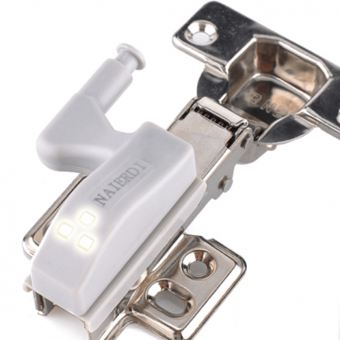 Hinge Light Brightens Cabinet Spaces
